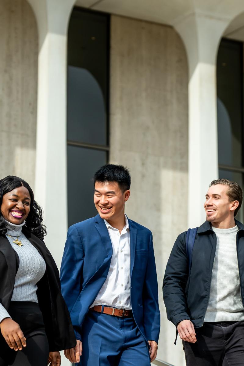 SPIA students walking in front of Robertson Hall